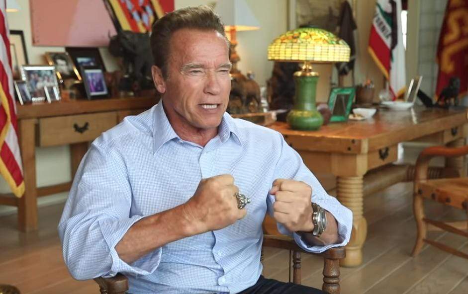 Arnold Schwarzenegger wearing his AJT Jewellery Angry Lion Ring