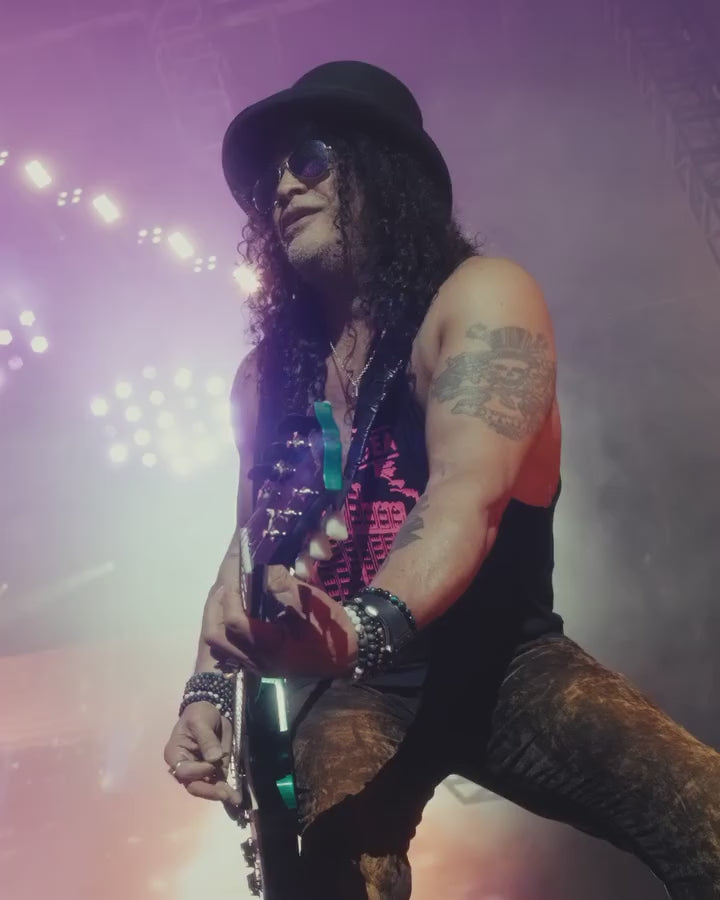 Slash performing with his AJT Living The Dream Skull Ring